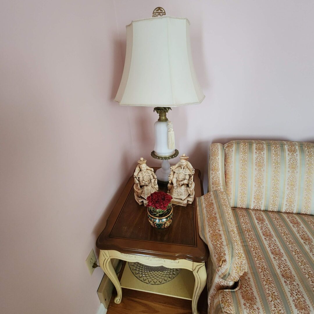 A Lampshade in White Placed Beside a Sofa