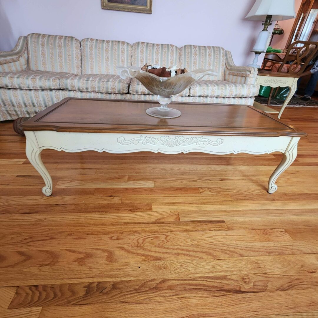 A wooden table in front of the couch