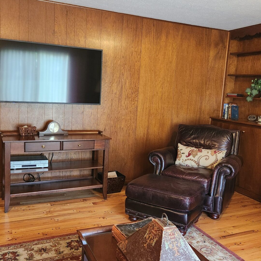 A Living Room Area With a Brown Couch