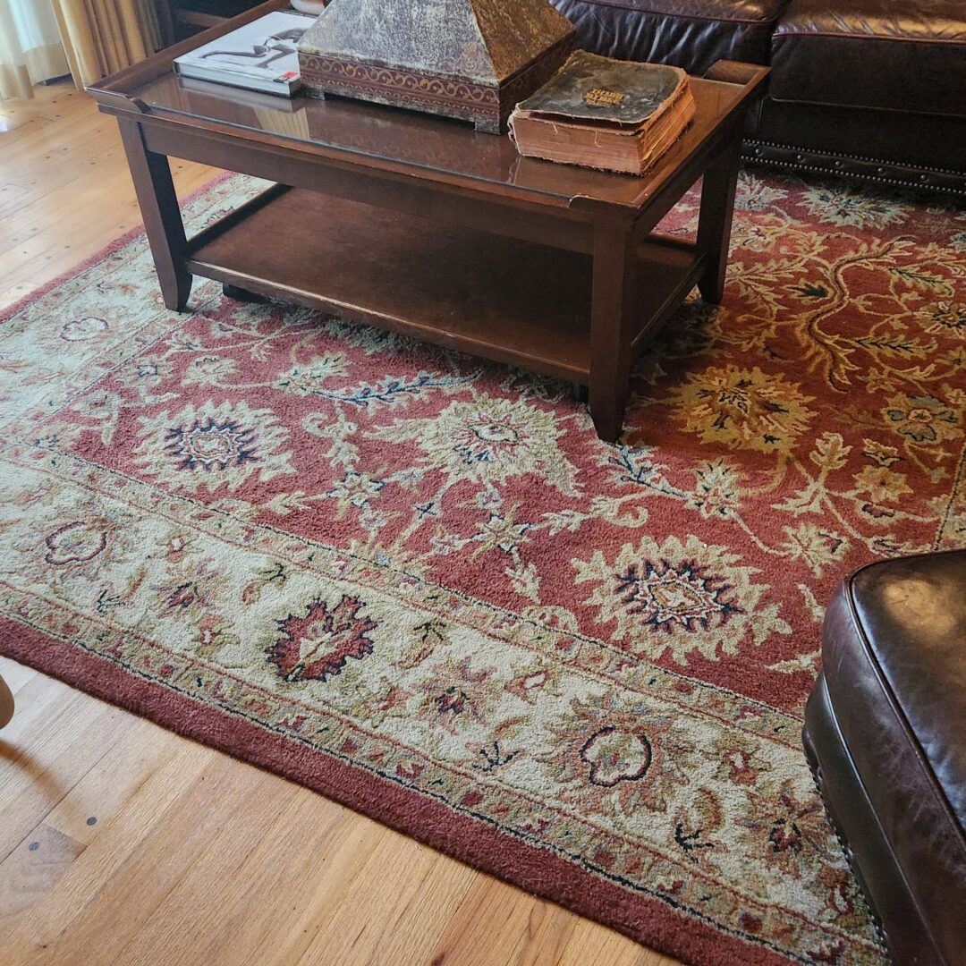 A Carpet Close Up in Cream and Red Color