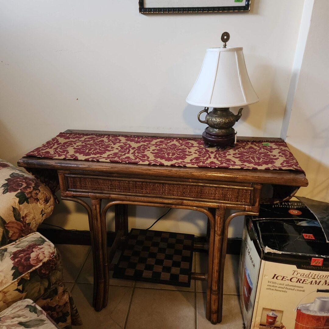 An Ornate Table Mat in Cream and Maroon