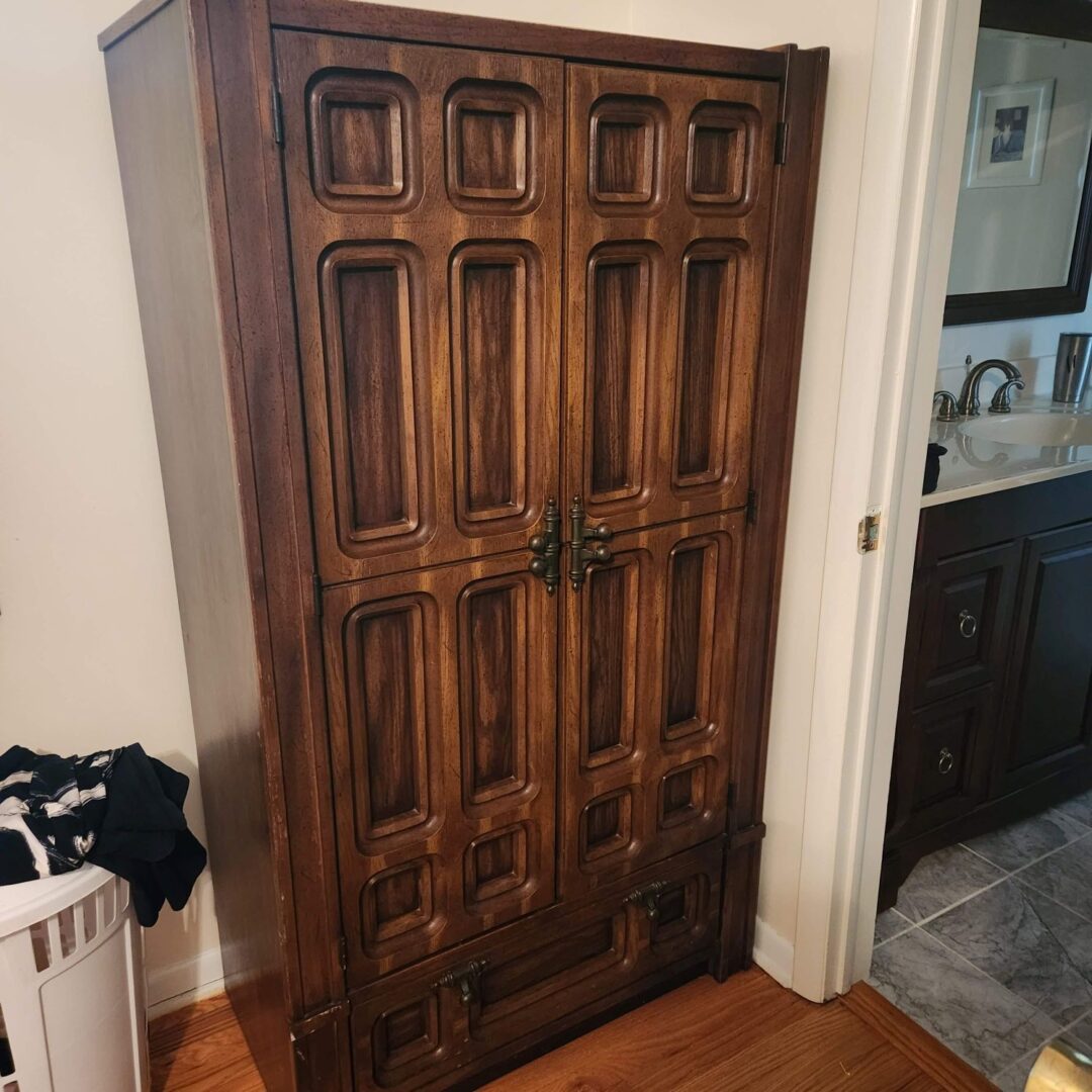 A Large Wooden Wardrobe With Two Doors