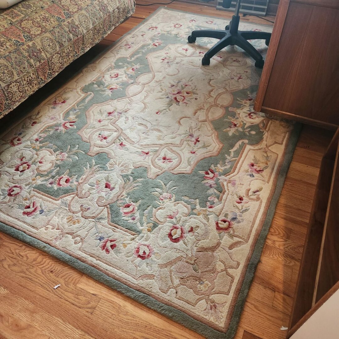 A Persian Rug in Grey and Cream Color